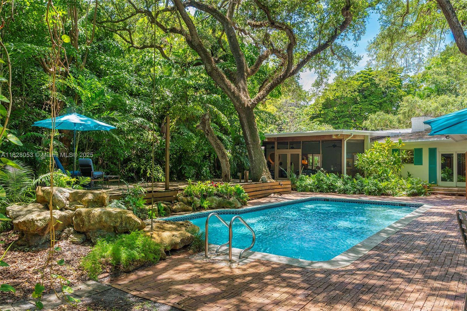 Enchanting Coconut Grove estate offers prestige, security amp ; a coveted address in The Moorings.