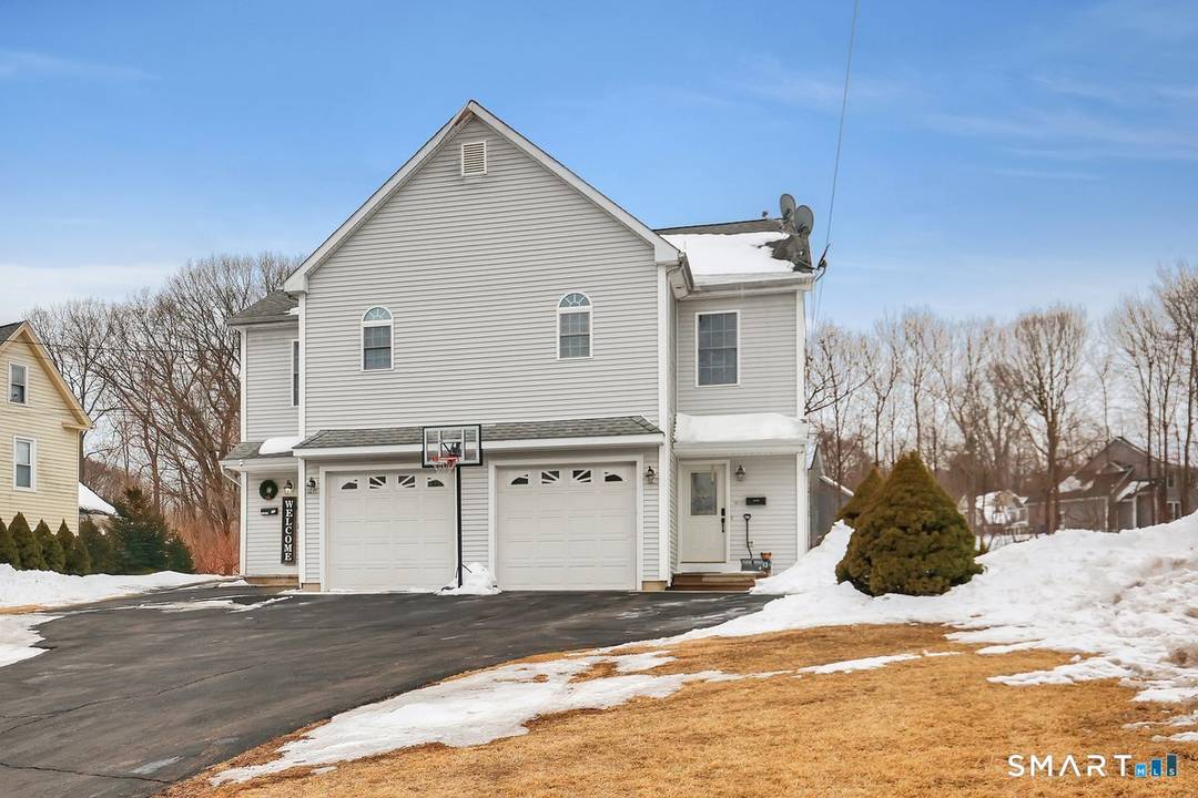 Welcome to a rare opportunity to own this half duplex just moments from the vibrant downtown area of Southington.