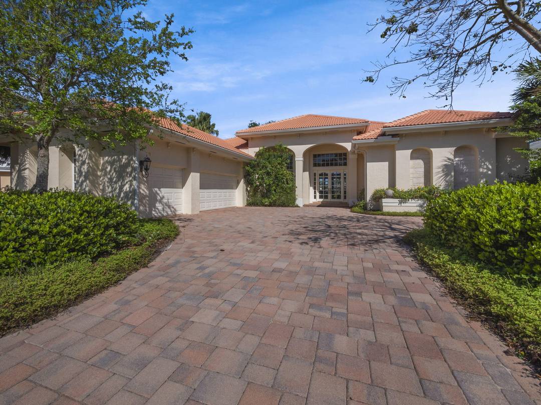 THIS GRACIOUS CUSTOM HOME HAS A GOLF MEMBERSHIP, GOLF AND LAKE VIEWS, IN THE VERY DESIRABLE ST JAMES NEIGHBORHOOD, CLOSE TO ALL BALLENISLES AMENITIES.