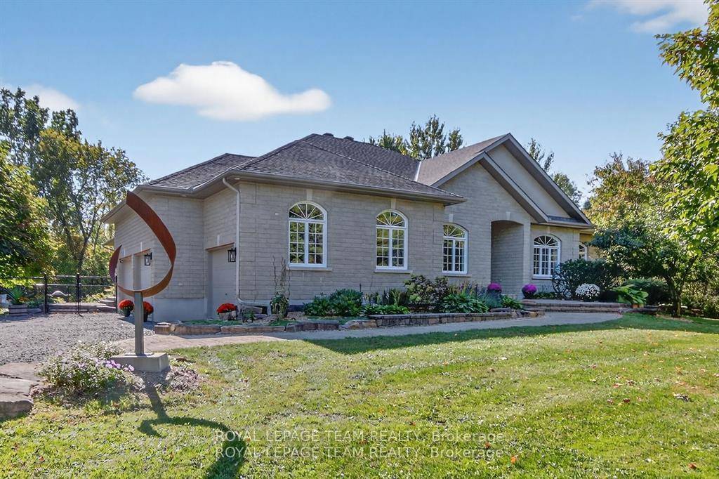 Situated in Orchard View Estates on a private 1.