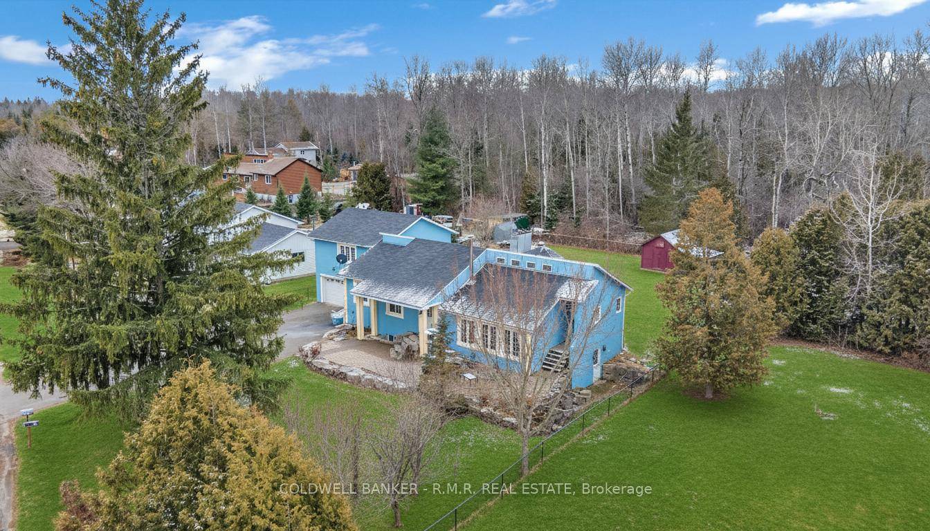 This elevated bungalow, nestled within a tranquil cul de sac, offers a serene escape while remaining conveniently close to amenities.