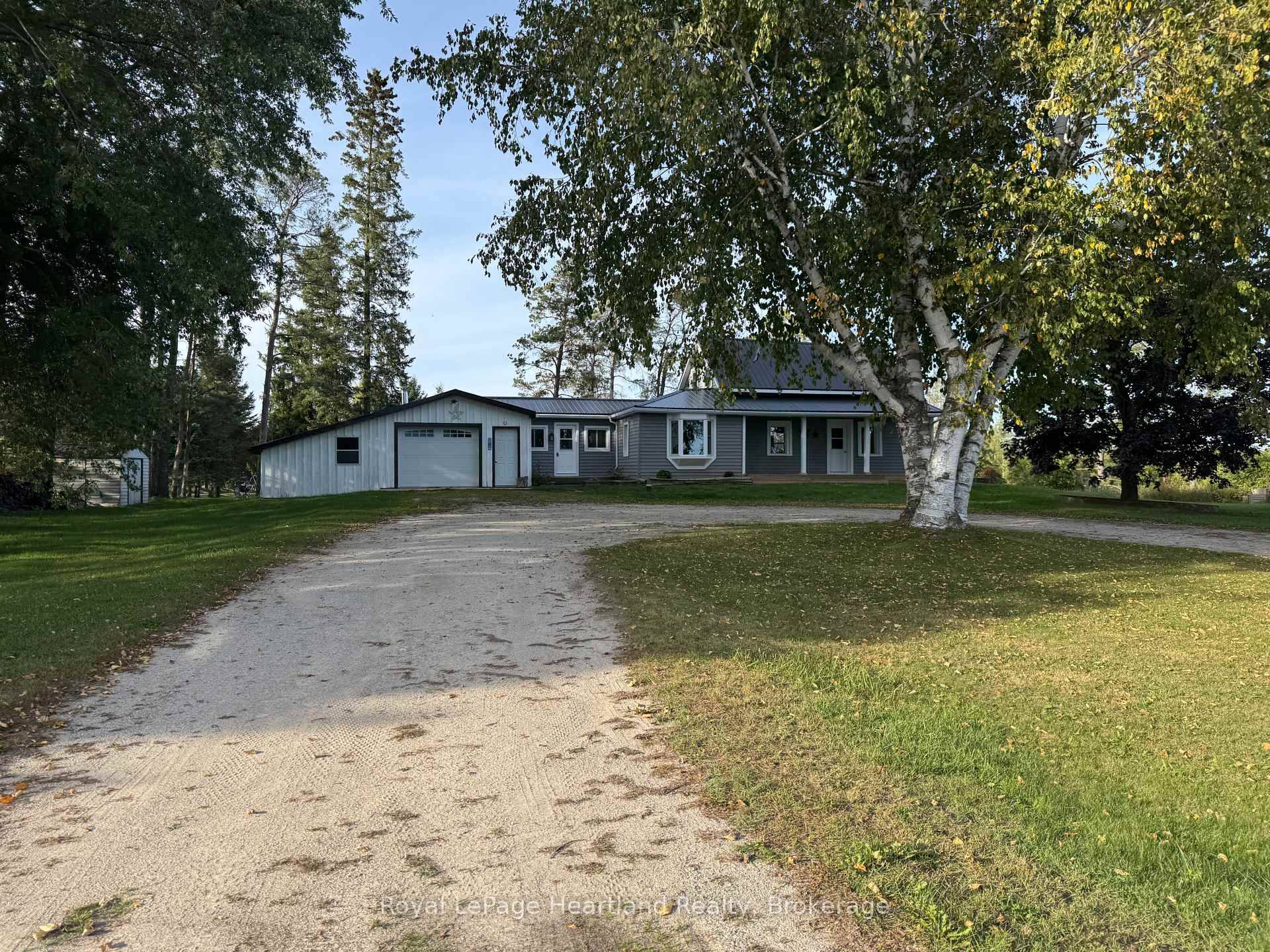 This tastefully updated 2 bedroom, 2 bath home combines the warmth of an original log home with the benefits of modern renovations.