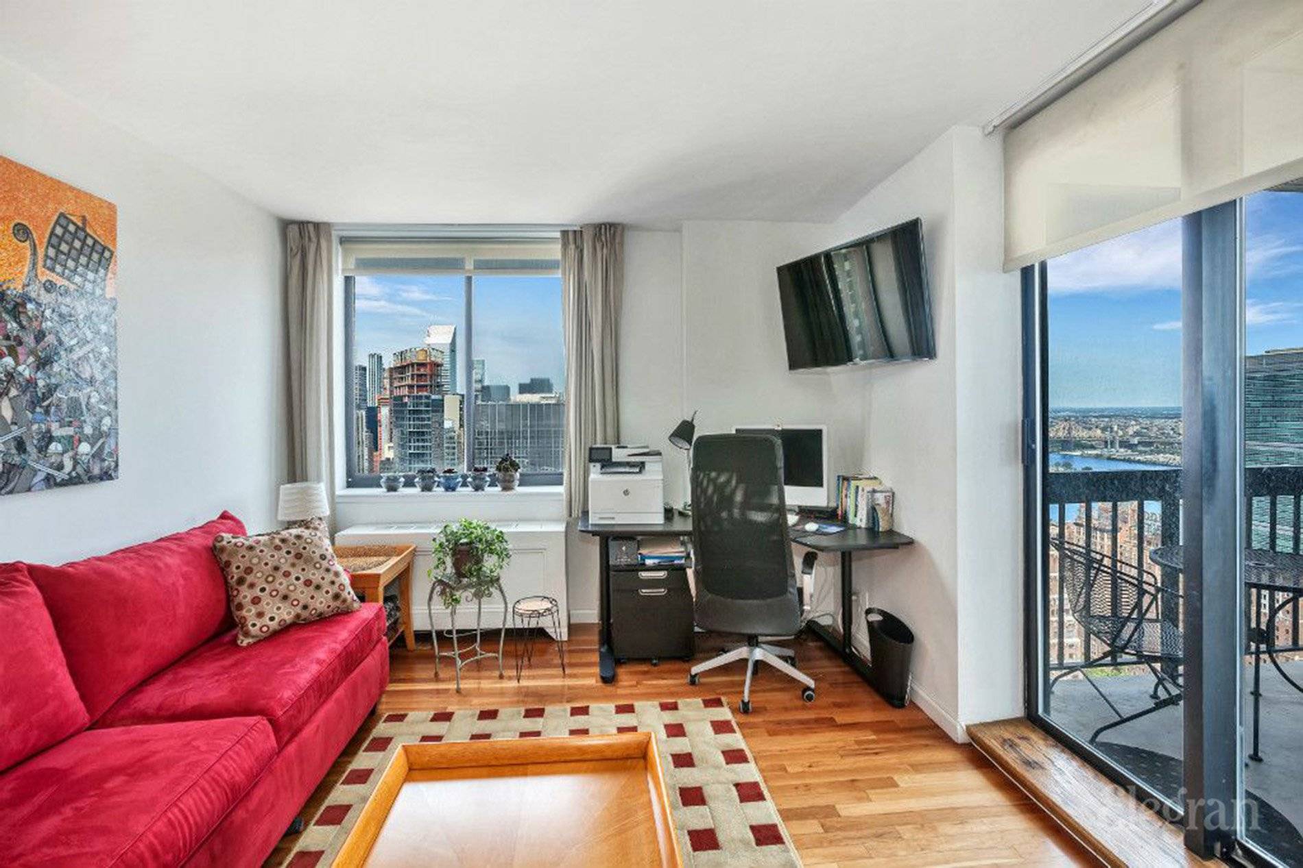 Sprawling Sun Flooded High Floor Condo with 2 Balconies and Spectacular Skyline and River Views.