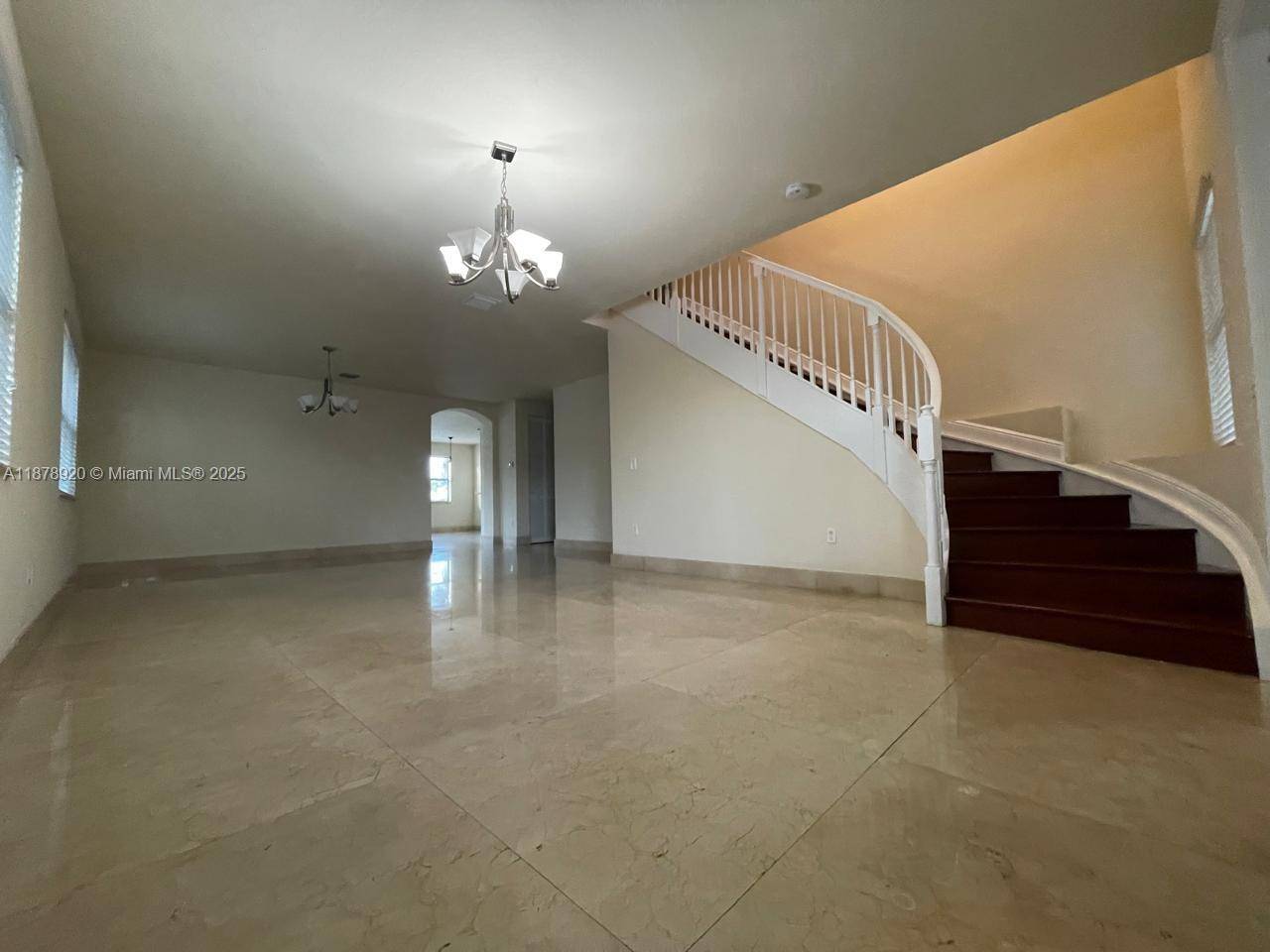 This beautiful single family home is located in the heart of Doral, within the highly sought after Grand Bay Condominium.