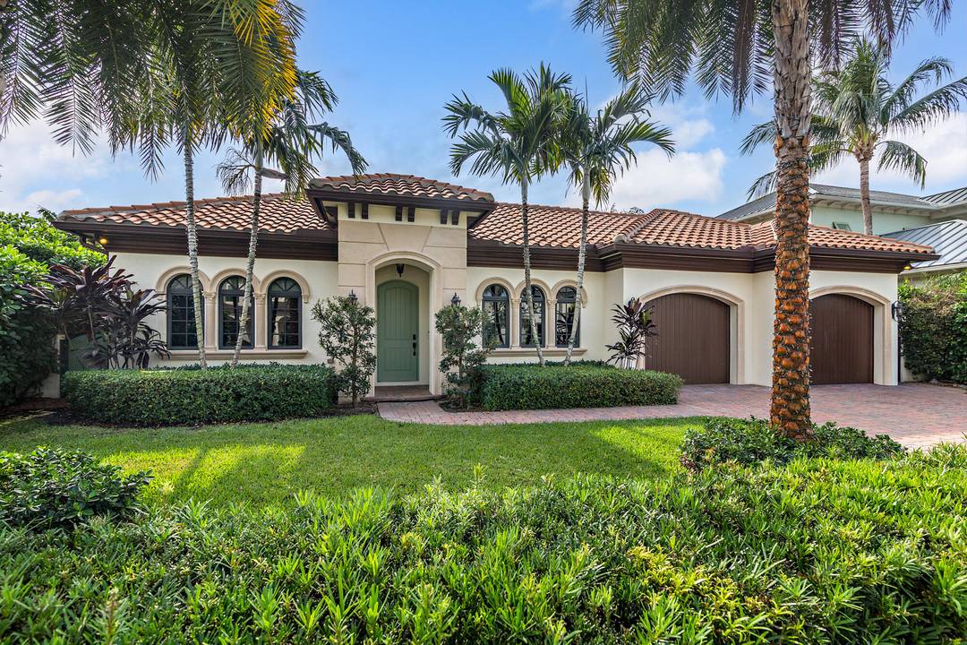 Enjoy effortless one story living in this 2016 custom built home on desirable Summa Street, east of Olive and just a block from Intracoastal access.
