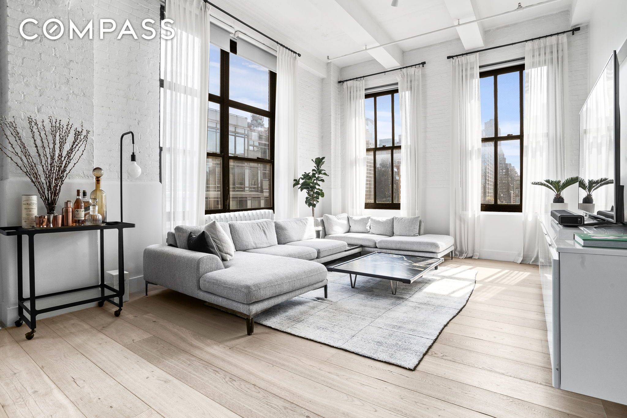 Step into a realm of luxury with this remarkable 2 bedroom, 2 bathroom corner loft, boasting an impressive 1, 897 square feet of sophisticated living.