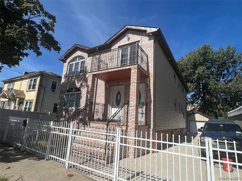 Huge two family custom built 6 bedrooms, 5 bathrooms, full finished basement.