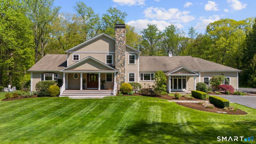 Nestled at the end of a cul de sac and bordering Cranbury Park, this exceptional custom built 2013 residence offers an extraordinary blend of luxury, privacy, and resort style living.
