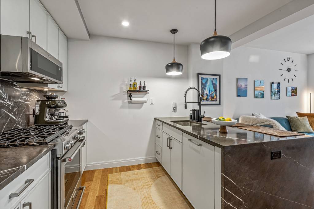 Step into luxury with this stunning, thoughtfully designed residence featuring high end finishes and seamless indoor outdoor living.