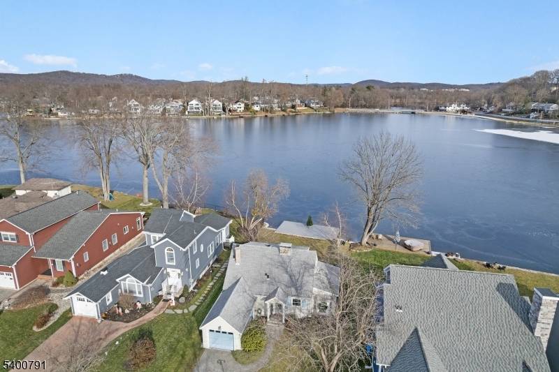 Available January 1st ! Experience true lakefront living on Indian Lake's Lenape ISLAND at this beautifully updated 3 bedroom, 2 bath lake style home with a 1 car garage, perfectly ...