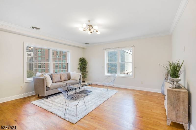 Located on one of Paulus Hook's most desirable historic streets, this 1, 100 sq.