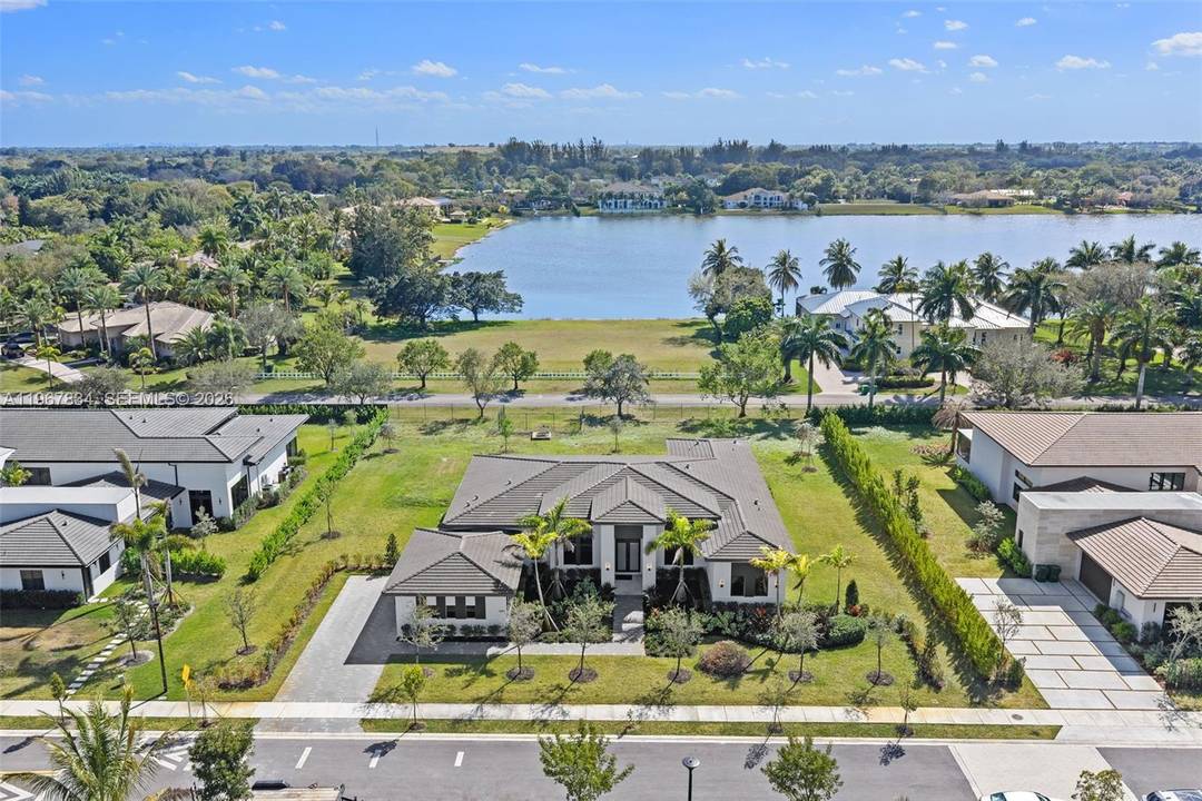 A Brand New Luxury Home located in an Exlusive Gated Community Zona West in Weston, offering Space, Comfort, and Privacy on 0, 6 acres.