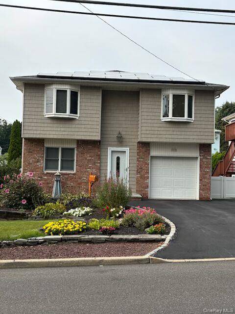 Welcome To This Bright And Inviting 5 Bedroom Home Situated In The Heart Of Bayville !