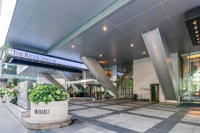 Welcome to a world of elevated elegance in this exceptional 2 bedroom, 2 bathroom corner suite, perched high above the city in one of Toronto's most prestigious addresses.