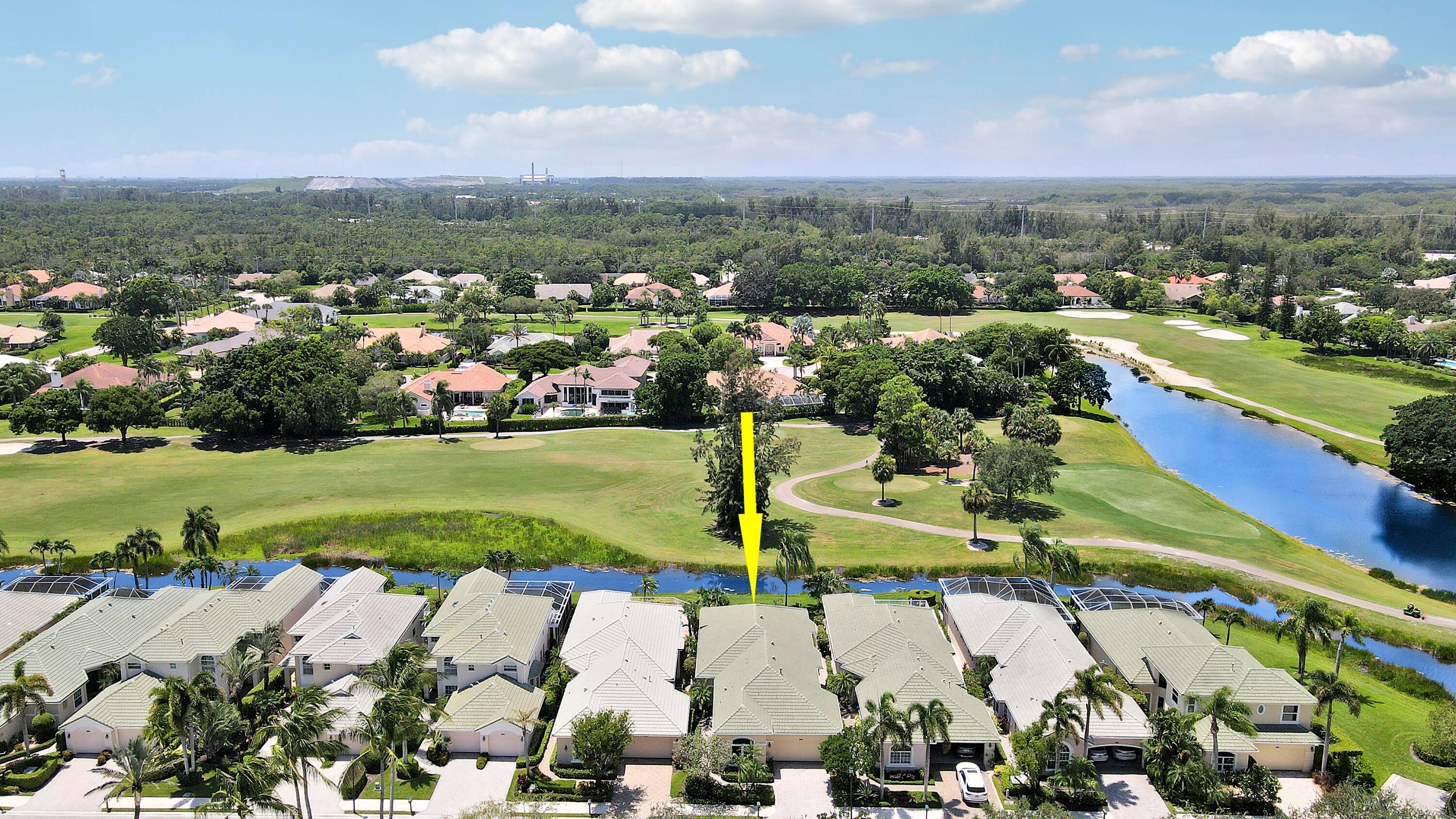 This single story, three bedroom three bathroom home offers a spacious living area and spectacular golf views of the 14th hole of the Palmer Course at PGA National.