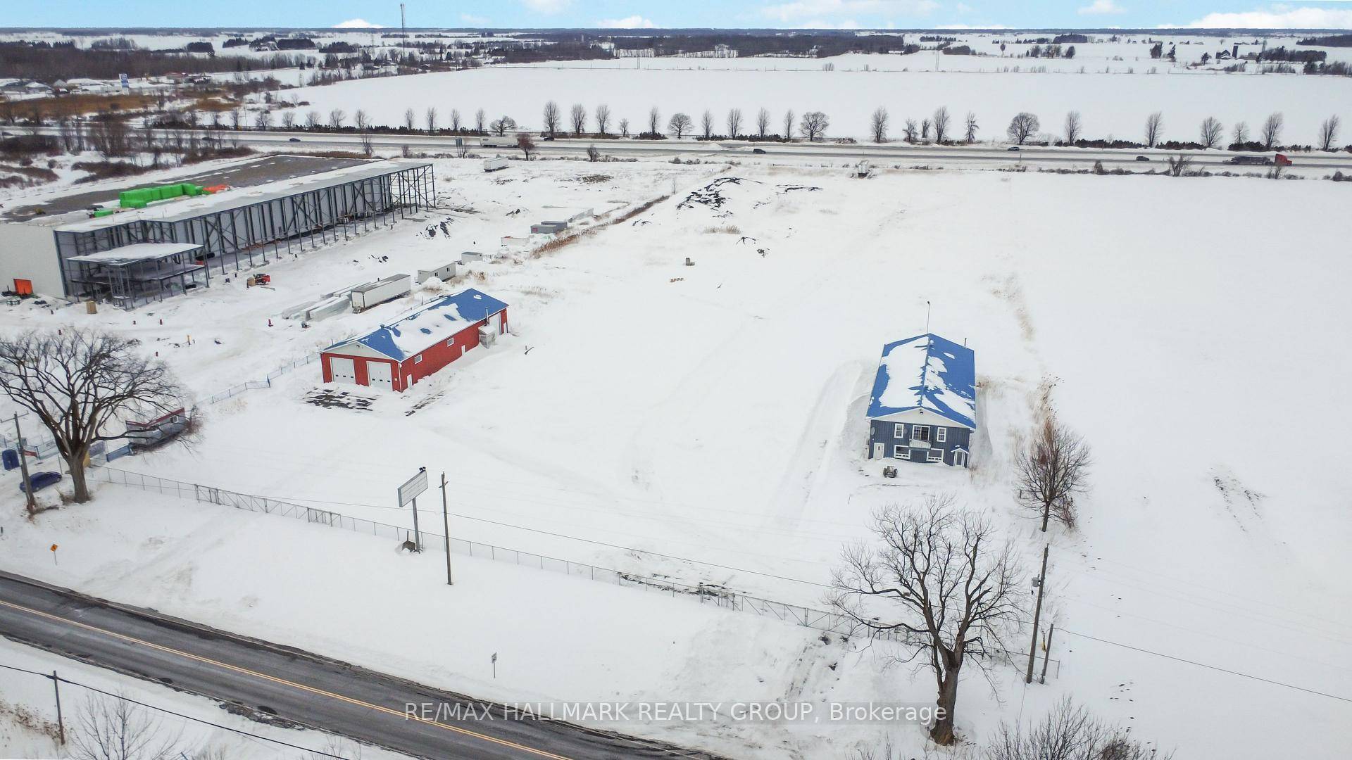 Strategically positioned with highway frontage and exceptional accessibility, this fully secured and fenced 7.