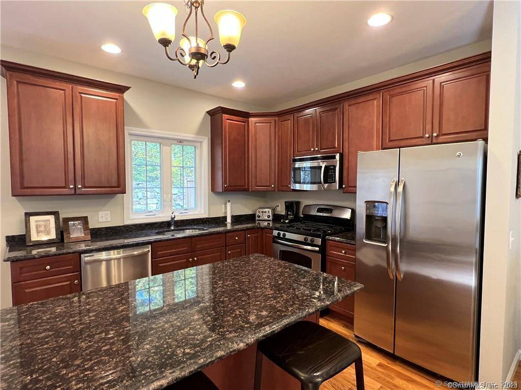 Discover the perfect blend of comfort, convenience, and flexibility in this spacious 3 bedroom, 4 bathroom end unit townhome with nearly 2, 000 sq ft of beautifully finished living space.