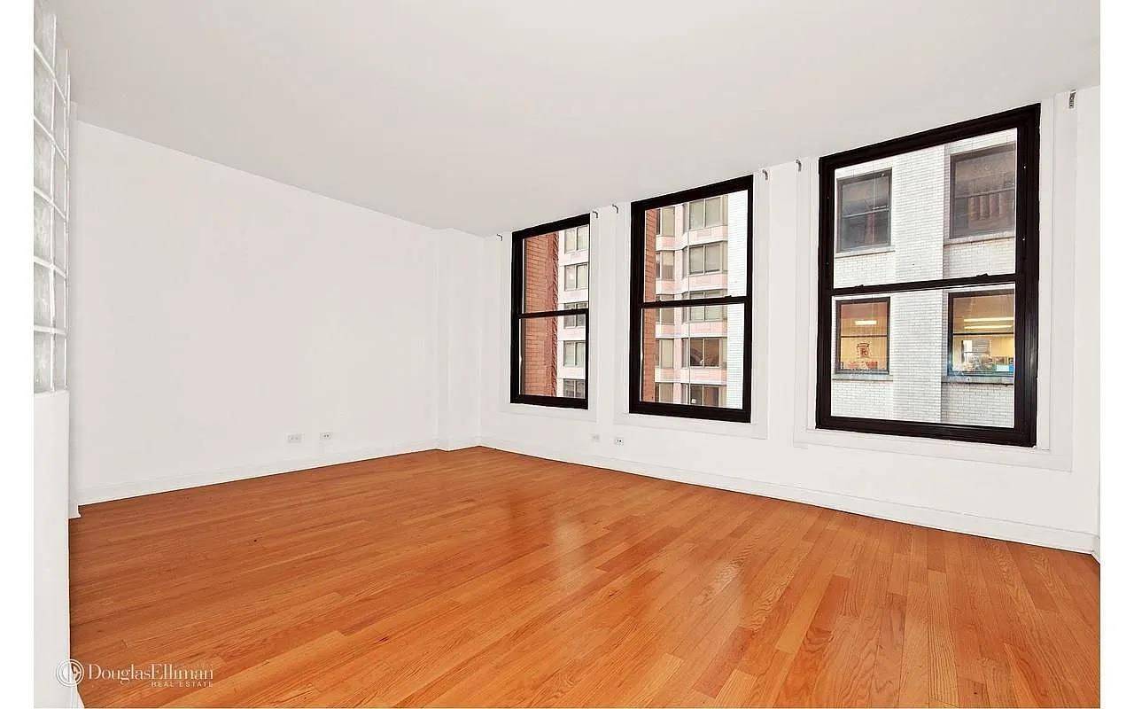 This spacious 775 sq ft condo has an open plan bedroom and a grand living room.