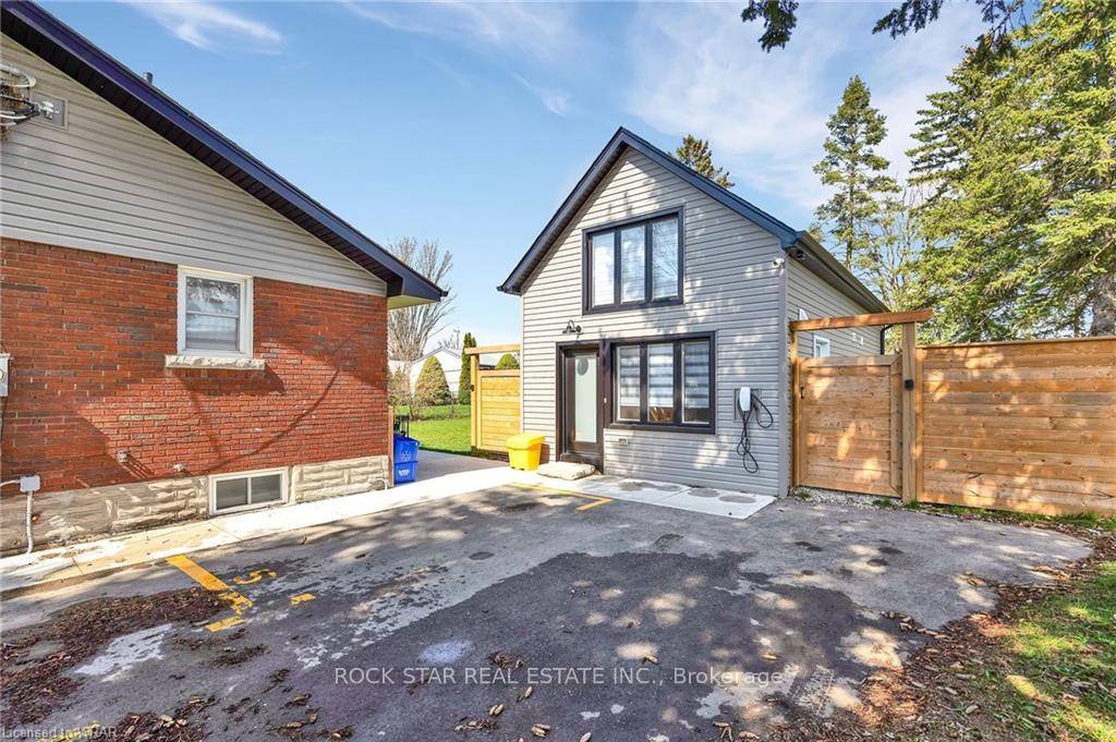 Welcome to Your Very Own One of a Kind Detached Rear Unit Home !