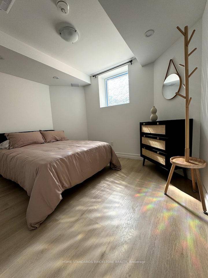 Ready to move in 2 bedroom lower level unit with private entry, parking, and legal status.