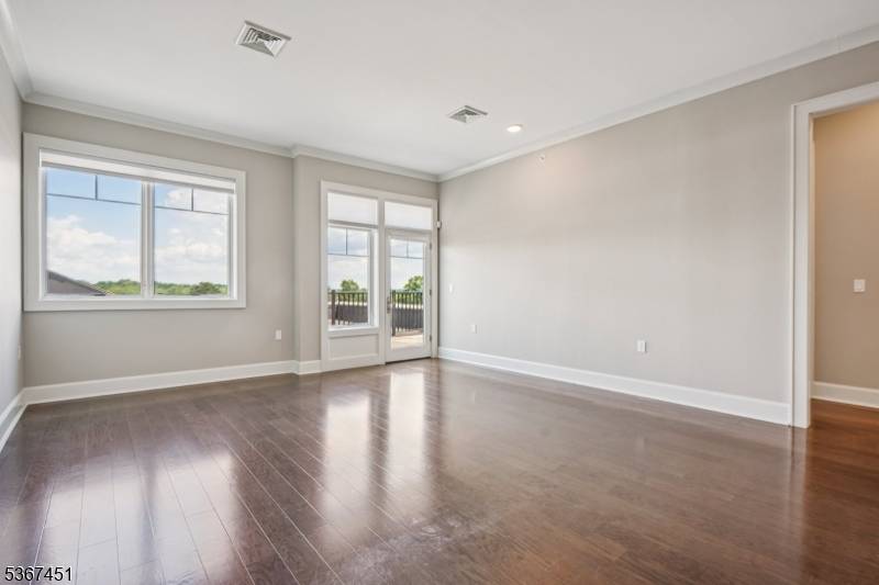 Perched on the top floor, this corner end unit offers the perfect blend of privacy, luxury, and convenience.