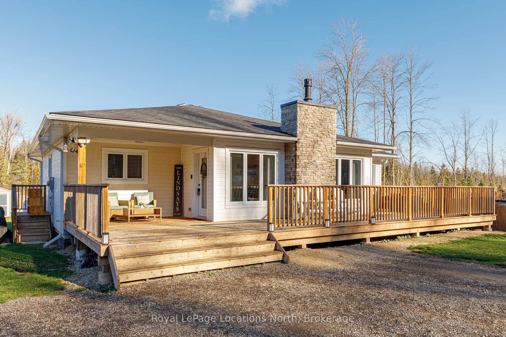 Beautifully crafted BUNGALOW, located just a short drive from Lora Bay, Thornbury, and Meaford, offering the perfect blend of modern efficiency and comfortable main floor living.