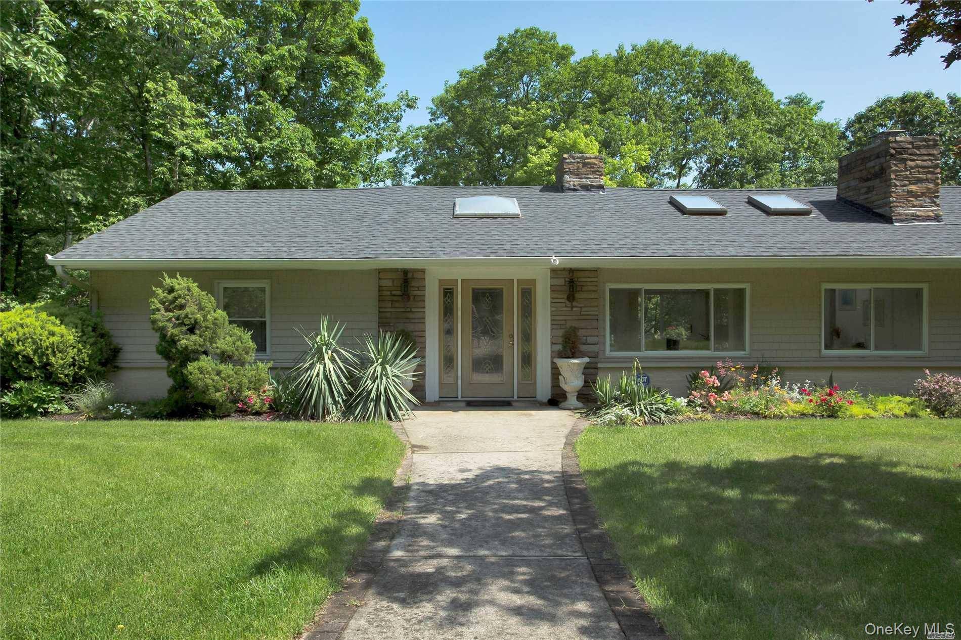 Peace and privacy abound at this spacious ranch on 2.