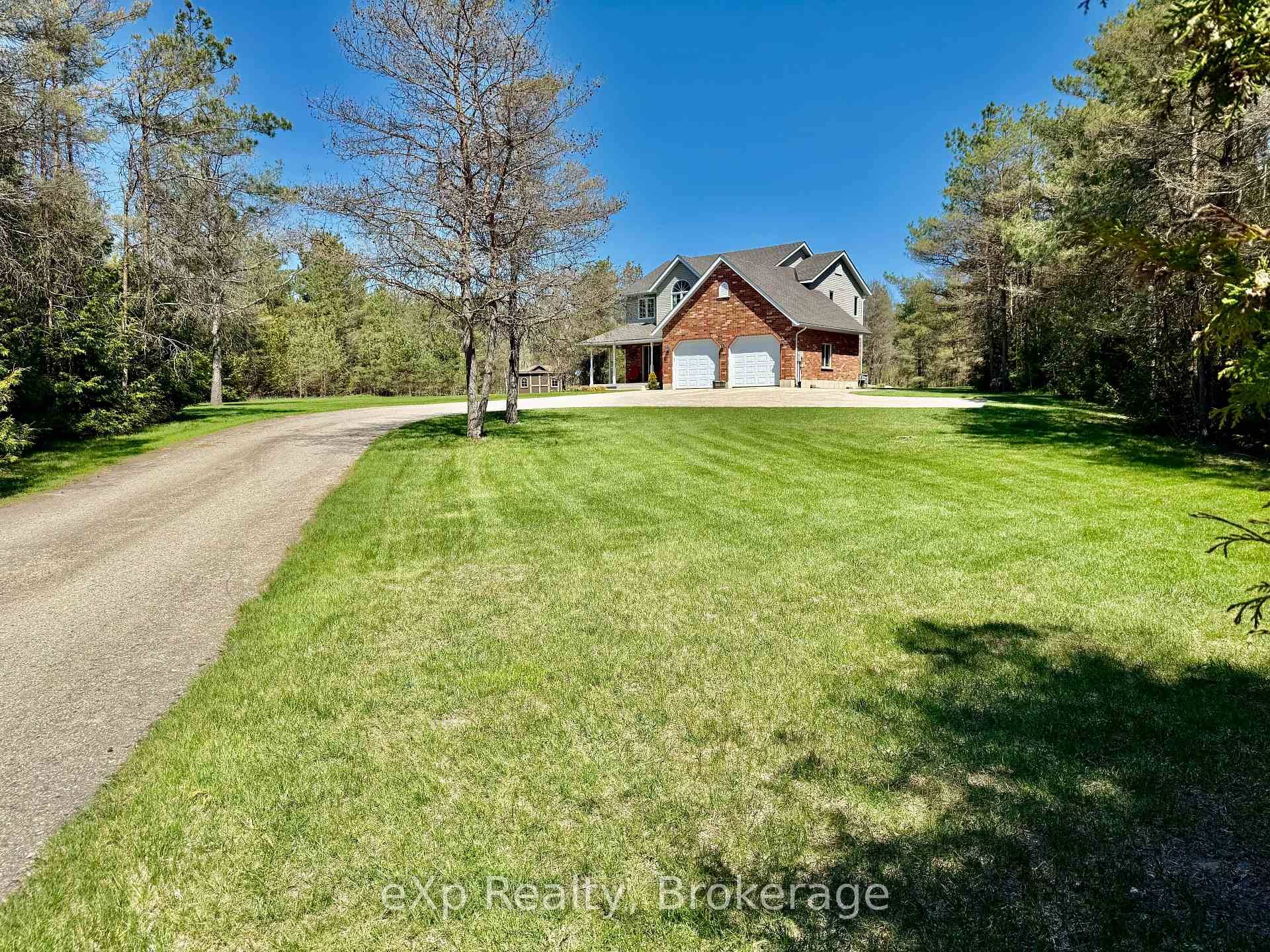Welcome to 323237 Durham Road E, West Grey Nestled on a beautifully maintained 4 acre lot, this stunning home is located only minutes from the town of Durham.