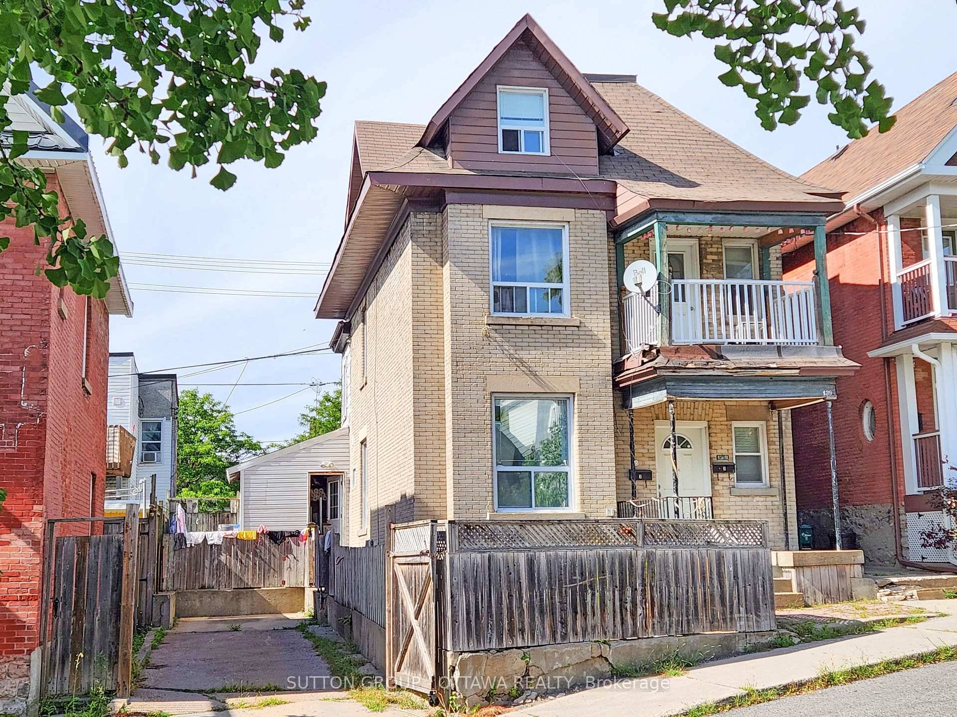 This 3 storey detached home in West Centretown is currently configured as an up and down duplex, with a separate side entrance to the upper unit.
