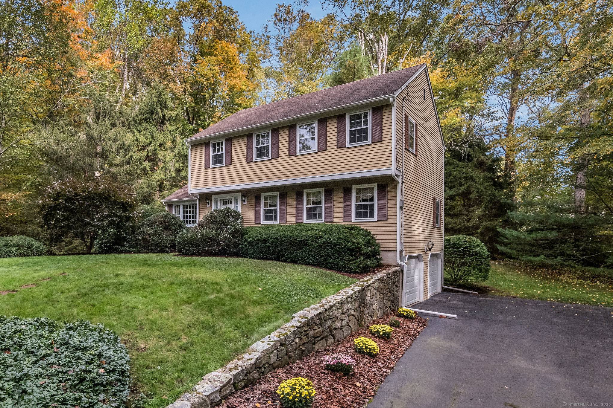 Tucked away on a sought after cul de sac just minutes from downtown Madison, 60 Robin Ridge is a beautifully maintained, custom built home, cherished by the same family for ...