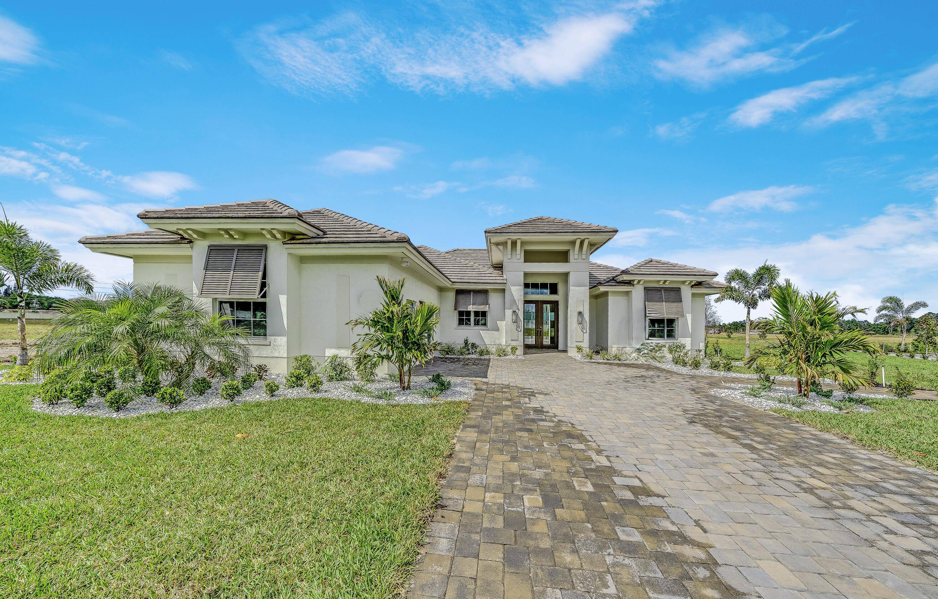 Beautifully designed home spans 2, 608 square feet of air conditioned space and 3, 527 total square feet, featuring 3 bedrooms, 2.