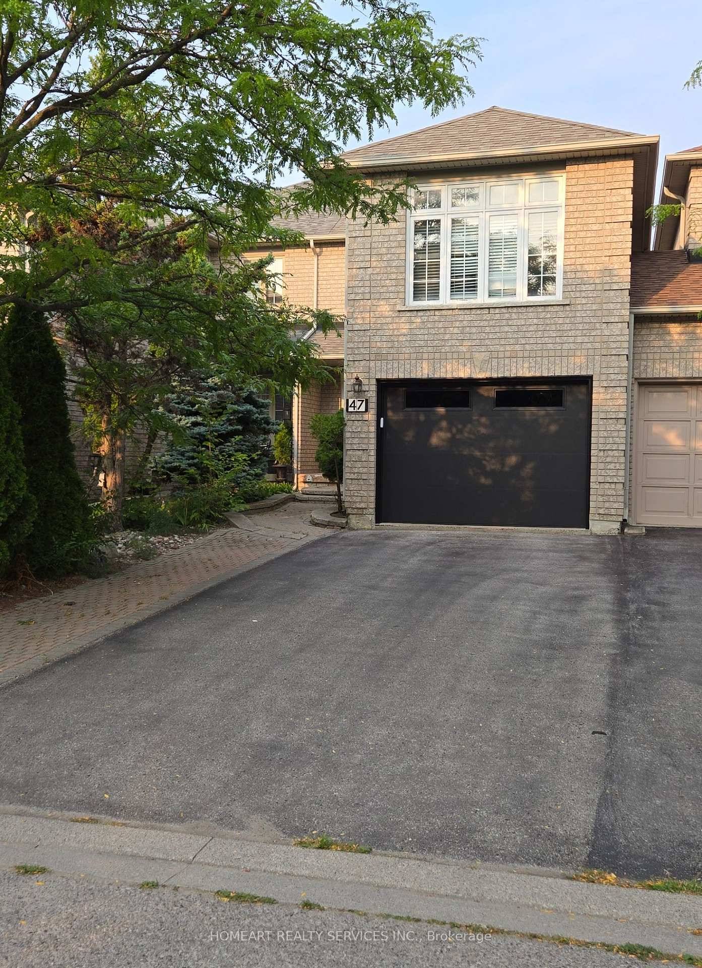 Well Maintained Freehold Townhouse in the Highly Sought After Rouge Woods Community.