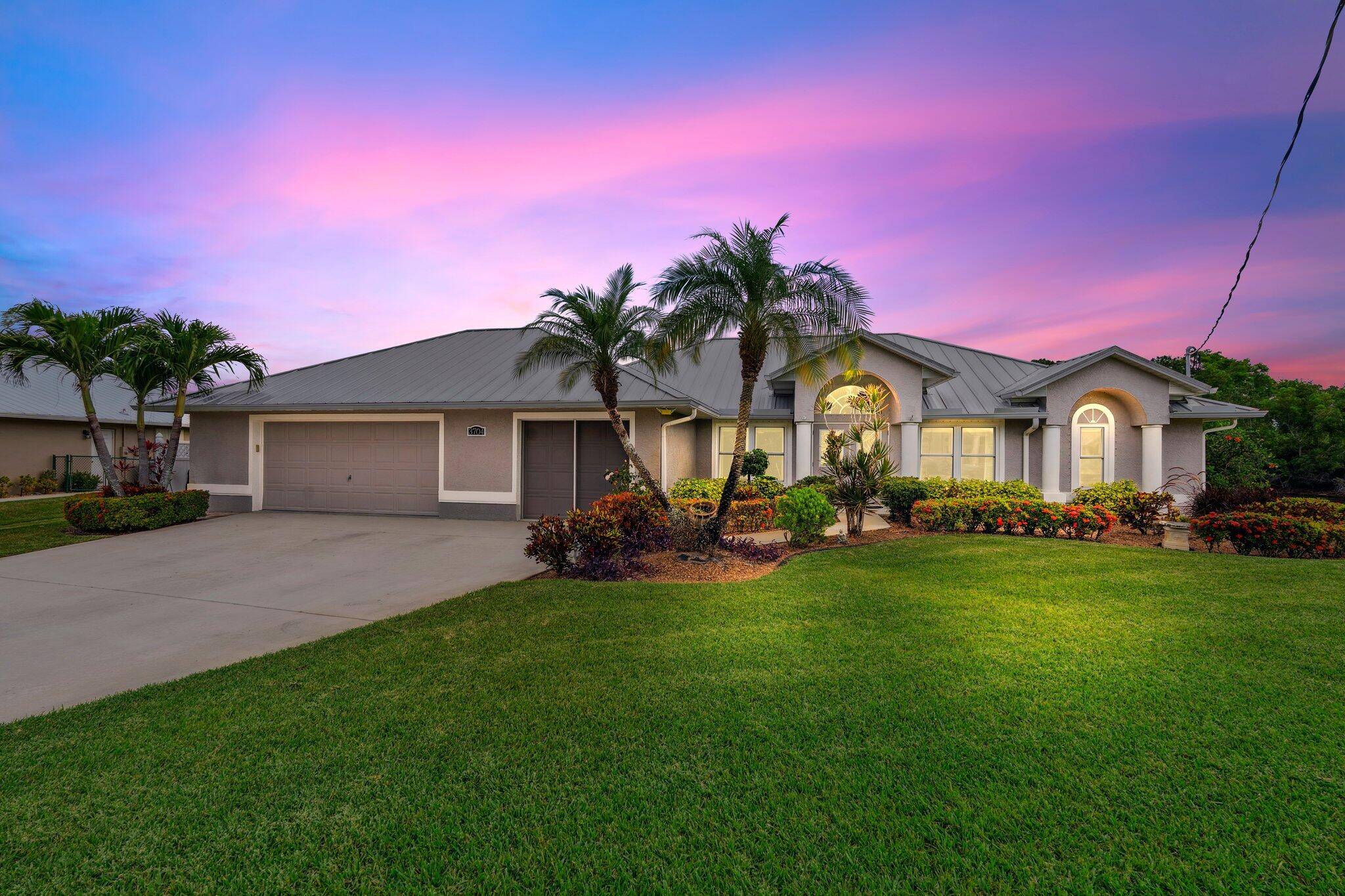 Located in Port Saint Lucie on a quiet cul de sac, this beautiful 3 bedroom, 2 bath home sits on an oversized lot with approximately 300 feet of canal frontage.