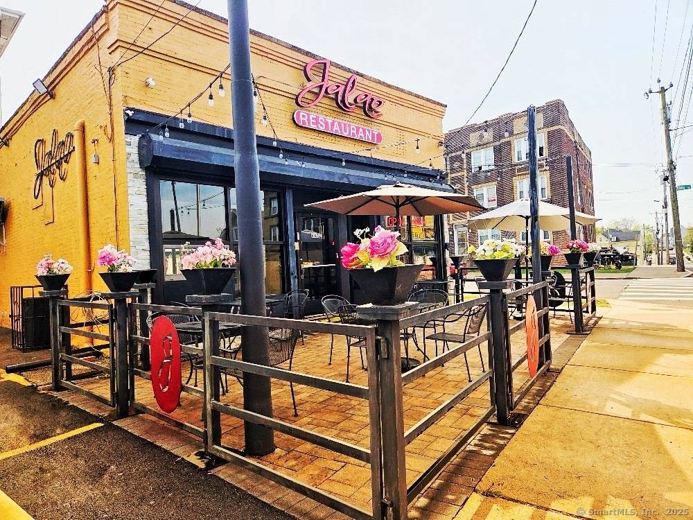 Turn Key Dominican Restaurant with Real Estate and Prime Parking A High Traffic Location !