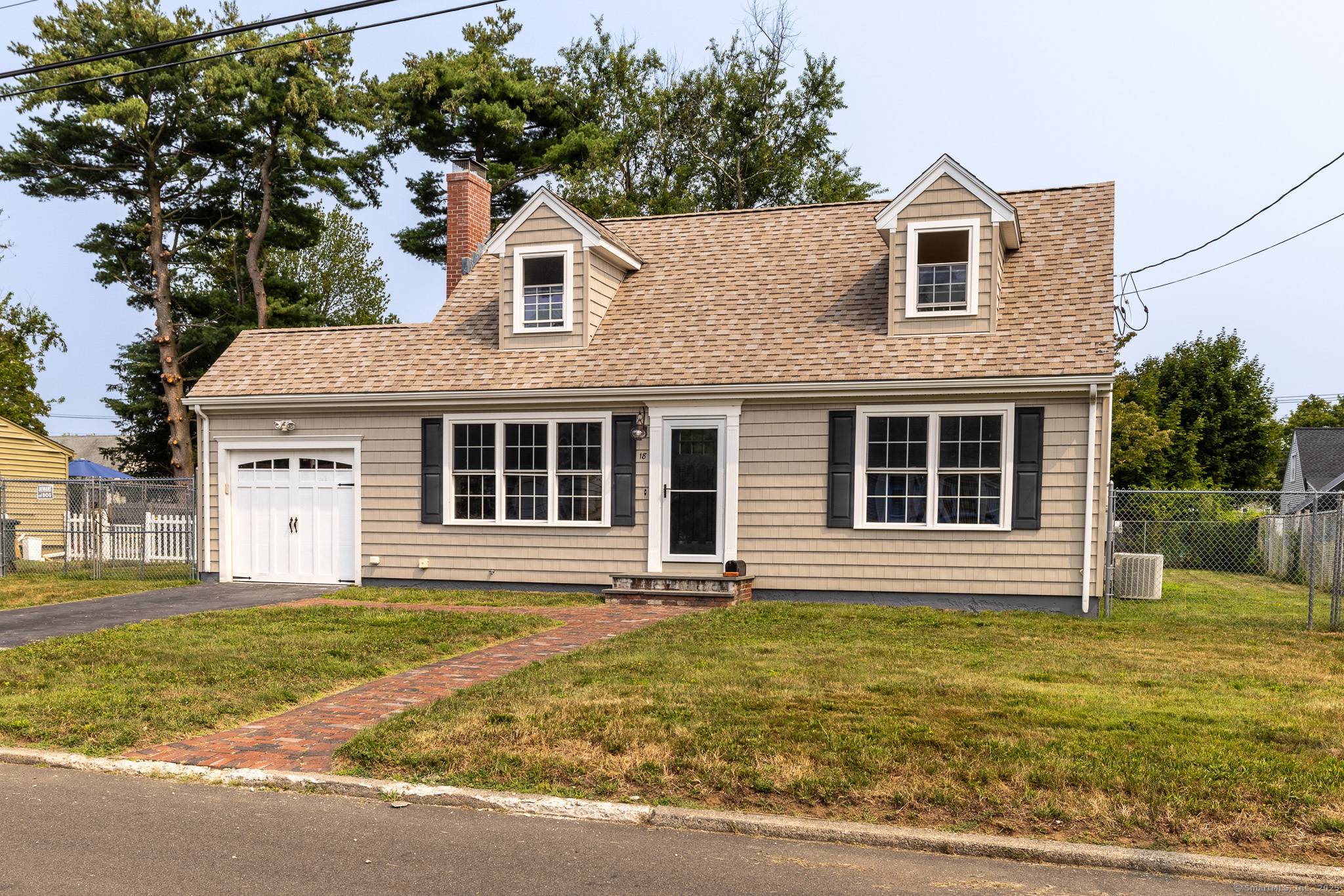 Charming Cape in Desirable Woodmont Area !