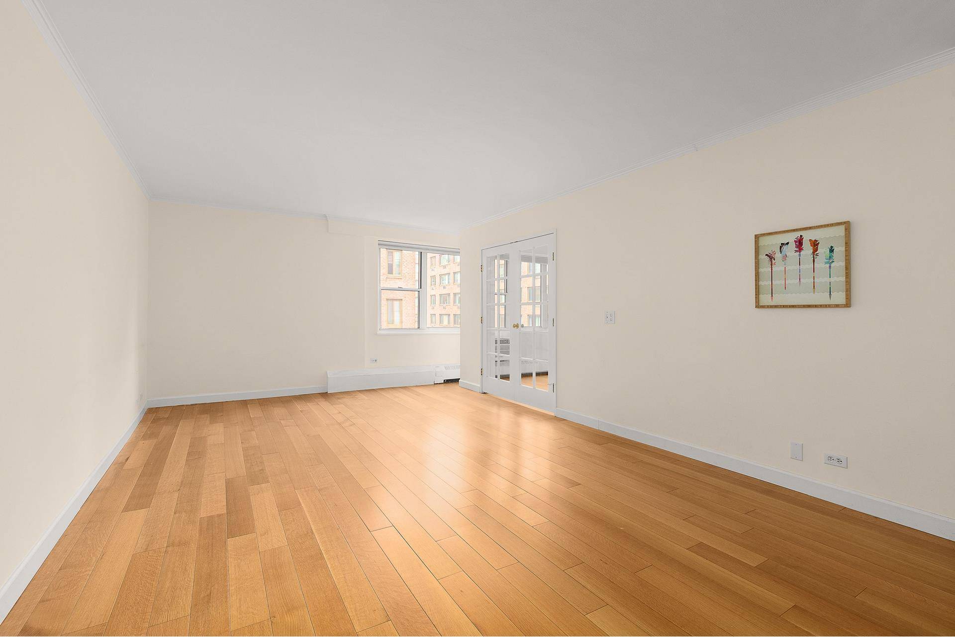 Oversized and converted 2 Bedroom 1 bath with large living room, renovated kitchen and West facing exposure.