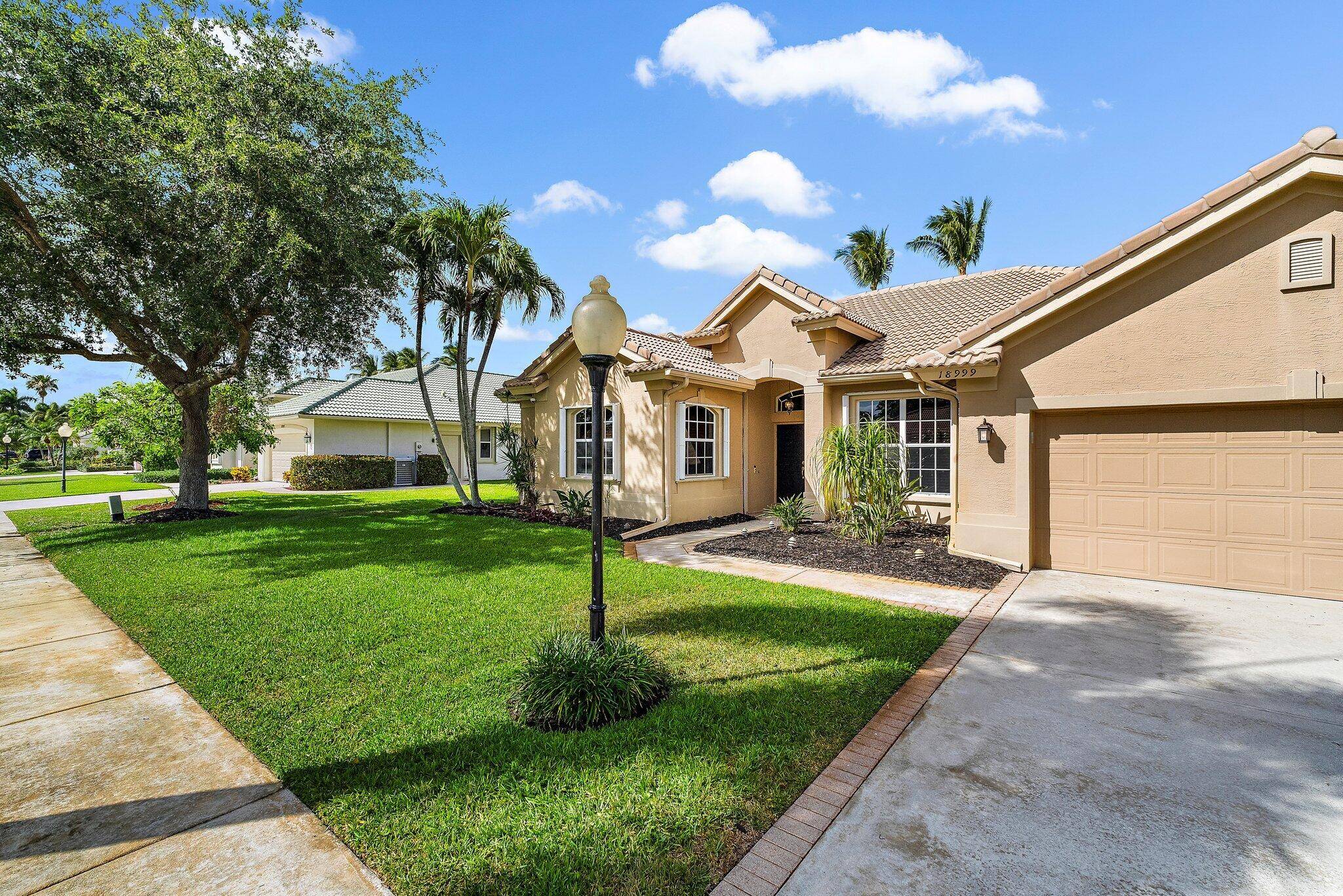 The MOORINGS. Beautiful 3 3 plus den home on an oversized lot.