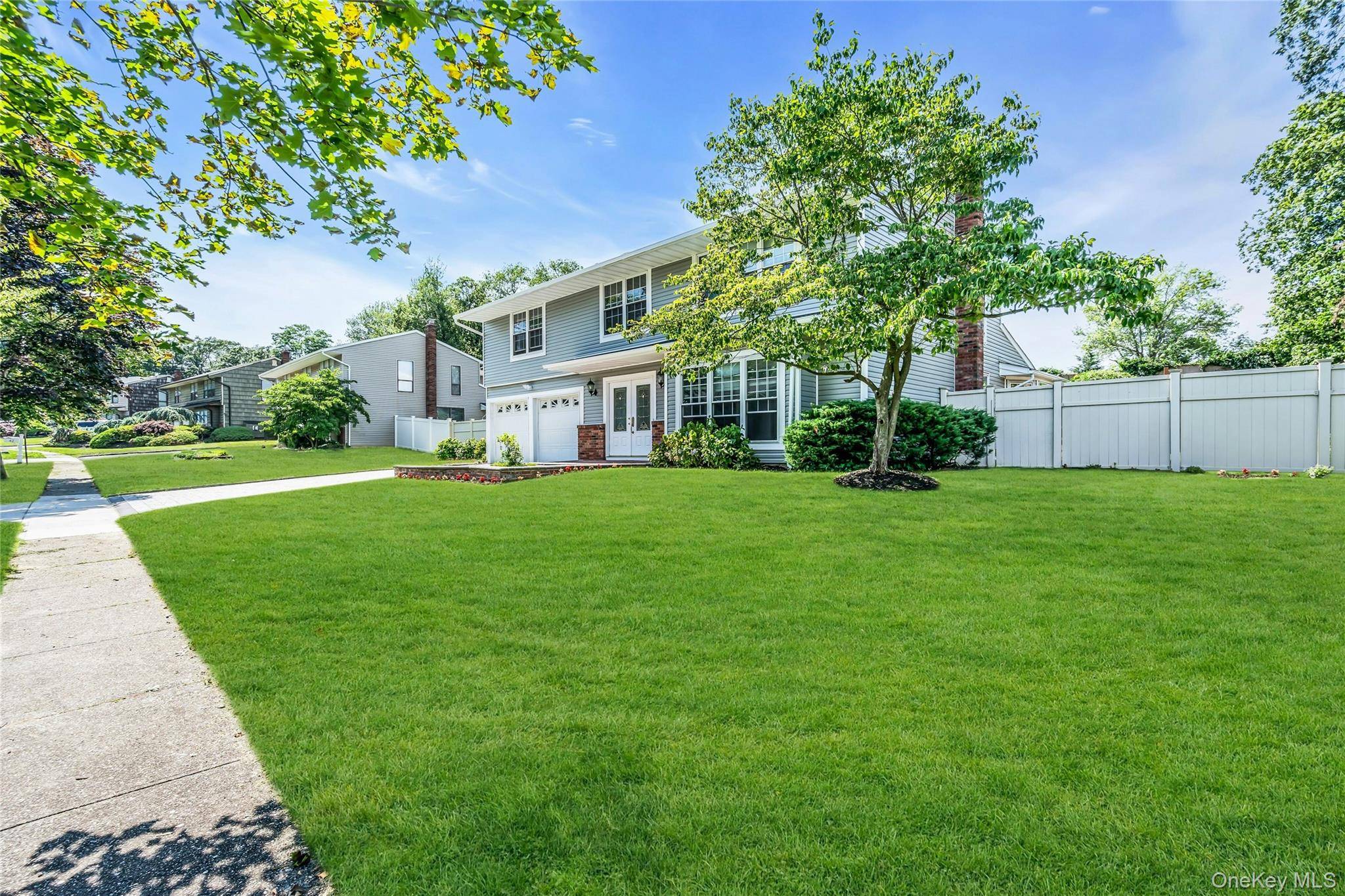 Large 5 Bedroom Brookfield Colonial with 2 Car Garage, Newer Roof and Vinyl Siding, 200 Amp Electric, Desirable Hauppauge Schools, Side Walks, New Eat In Kitchen with Quartz Counters, New ...