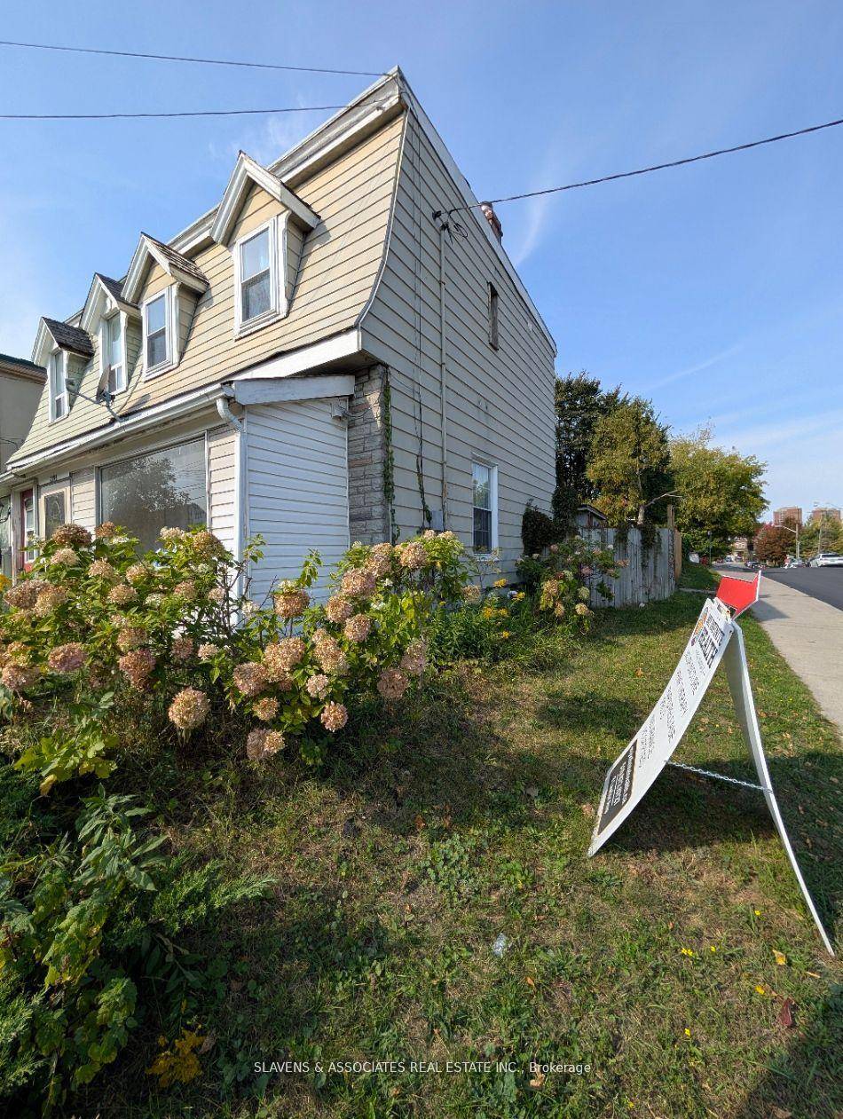 3 self contained income generating corner lot property.