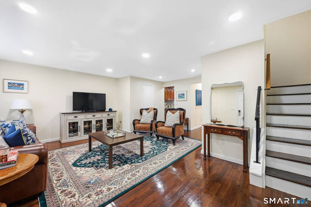 Desirable Springdale location boasts a well maintained and inviting three bedroom, three level Rowhouse and outdoor patio offering exceptional value with no HOA's.