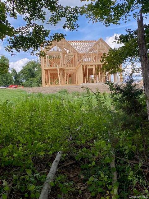 New construction colonial being built in Round Hill Estate, a picturesque 6 lot subdivision nestled in the charming town of Warwick.