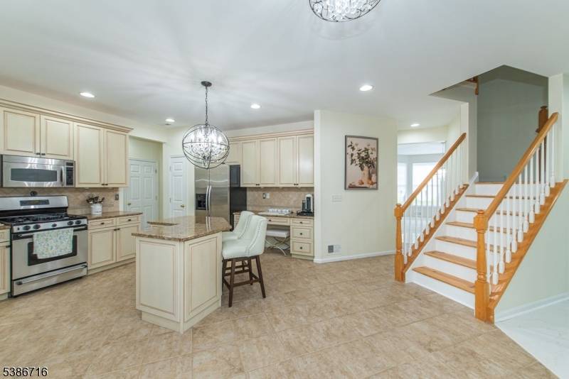 Welcome to Oak Hill ! This stunning residence is one of the largest in the development, offering a grand entry foyer that opens to a spectacular great room with soaring ...