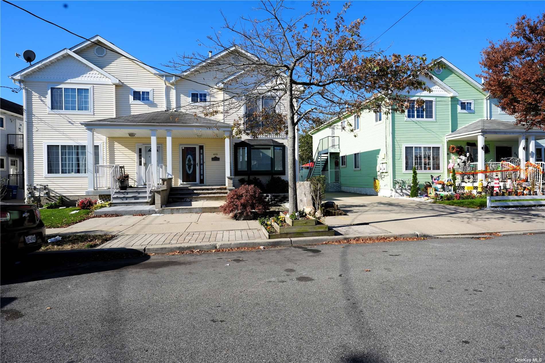 Nestled at 415 Beach 36th St, this two family home is a true masterpiece of comfort and style.