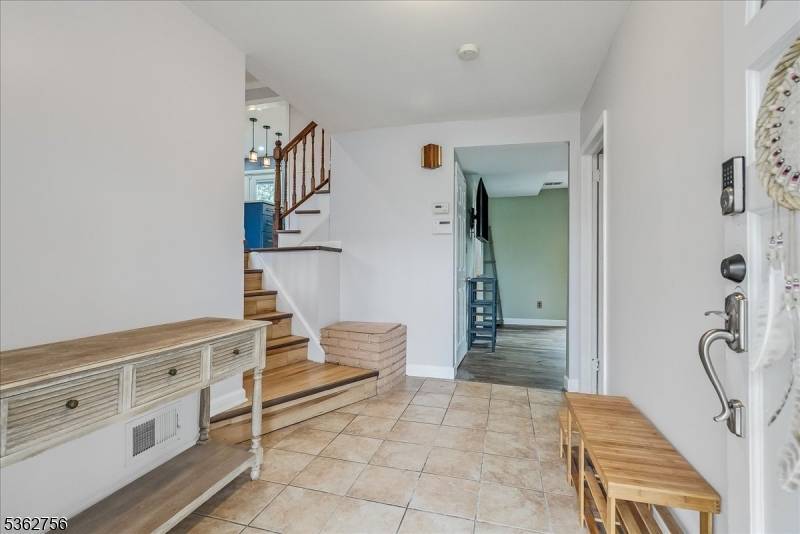 Nestled on a quiet street yet close to suburban conveniences, this beautifully maintained 4 bedroom, 2.