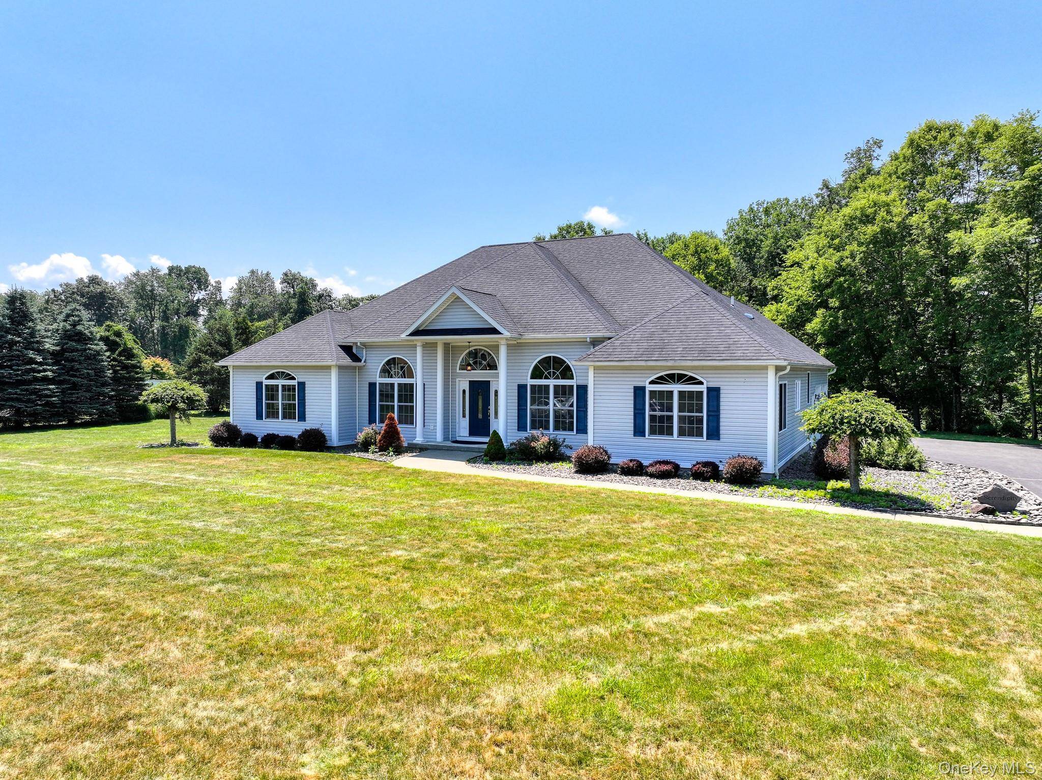 Welcome to ''Serendipity, '' a slice of serenity at 14 Regans Way, a charming and private retreat nestled in the highly sought after area of Germantown, NY.