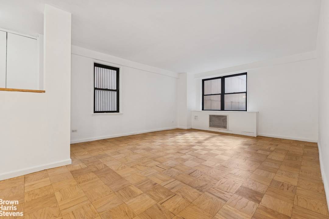Peaceful, Renovated Corner Studio with Chrysler Building Views This move in ready gem can easily convert to a junior one bedroom.