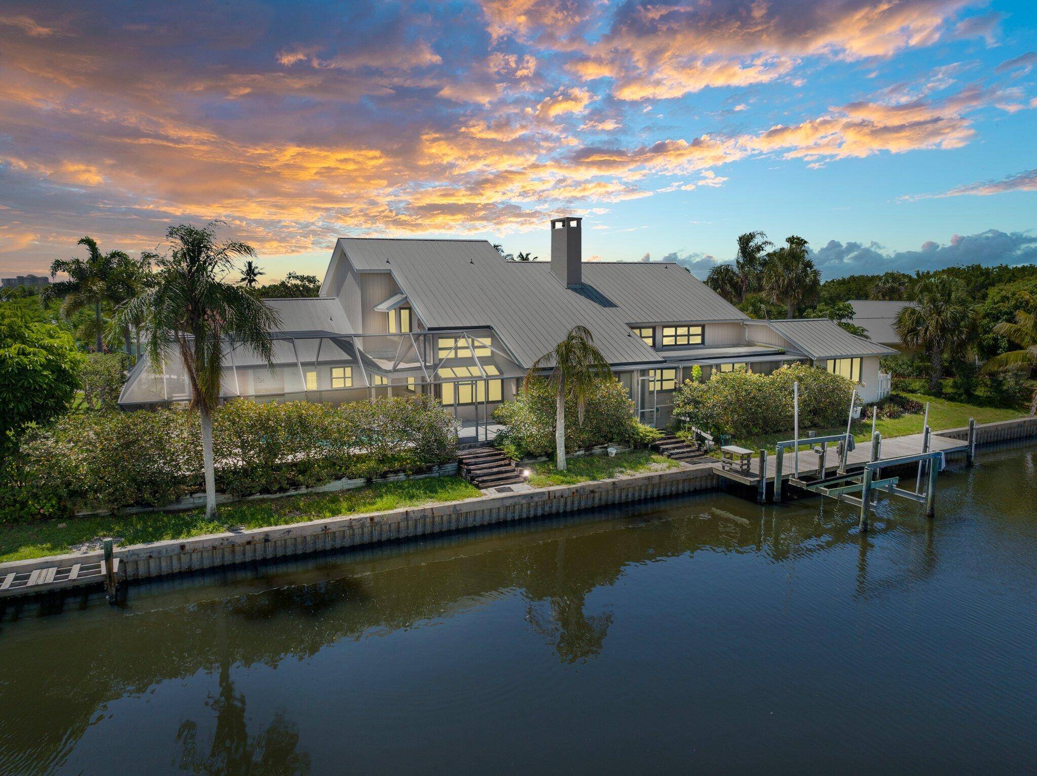 Discover the rare opportunity to own in the highly sought after waterfront community of Queens Cove on North Hutchinson Island.