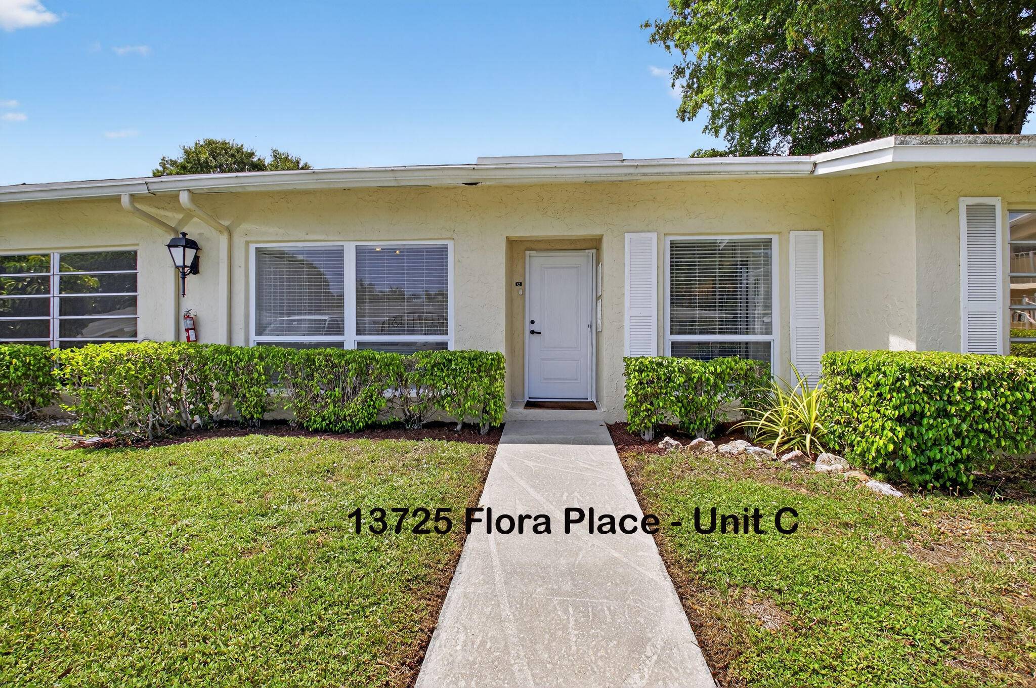 LOCATED in the POPULAR 'FLORA PLACE' NEIGHBORHOOD of PALM GREENS 1.
