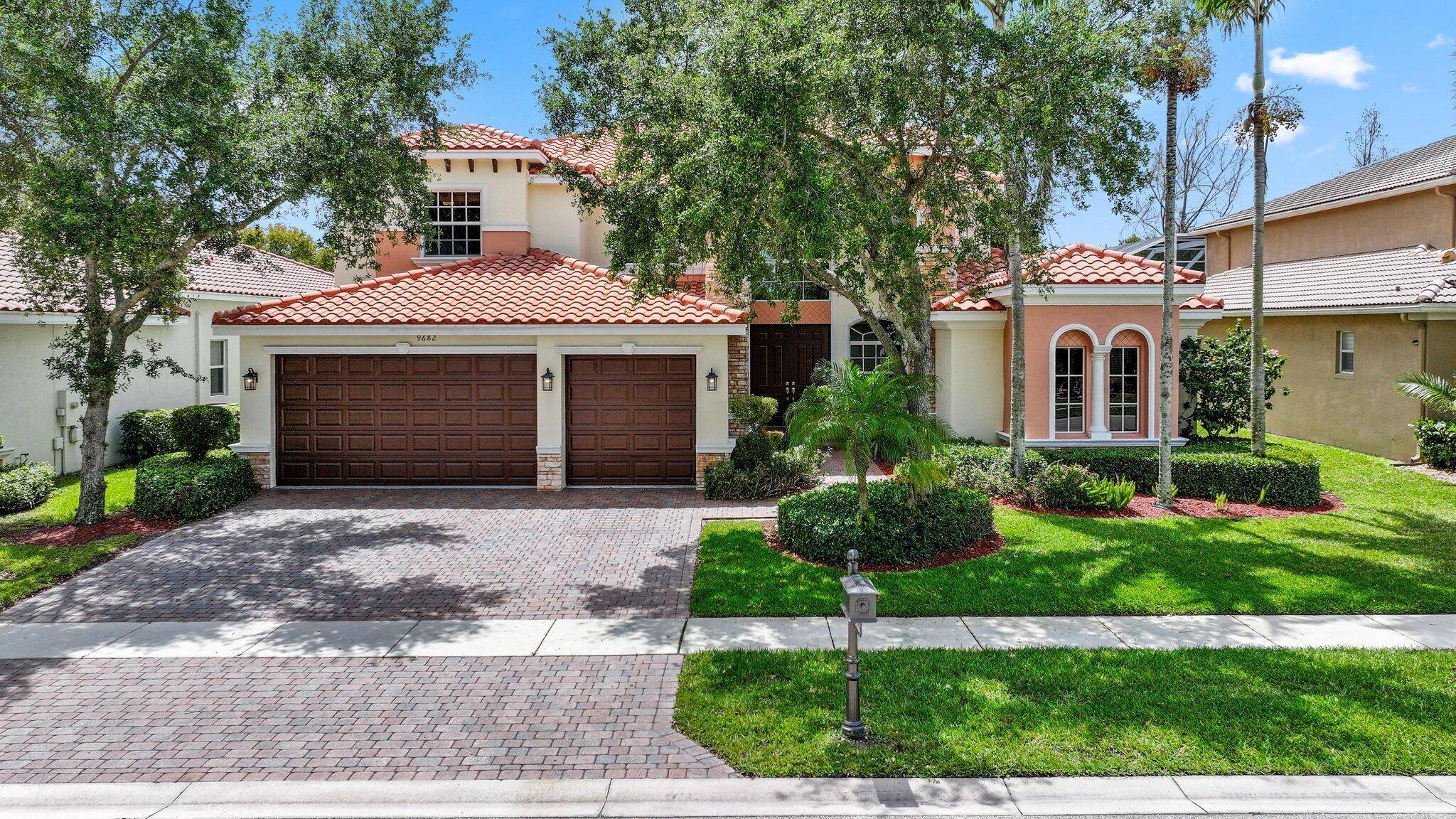Welcome to this absolutely stunning, expansive 5 bed, 4 bath single family home in Isola Bella Estates !