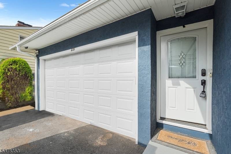 Beautifully updated home featuring an open layout with abundant natural light, refinished hardwood floors, and stainless steel appliances.